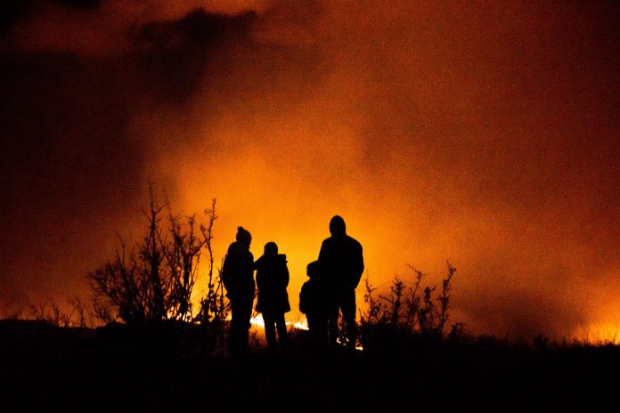 Travellers Hiking in California - Castaic large wildfire